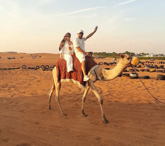 camel riding in vip safari