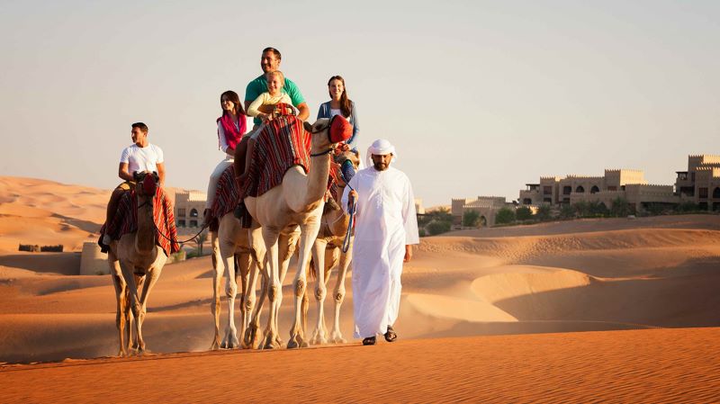 Camel Riding dubai vs abu dhabi